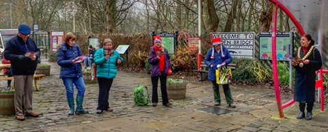 Deputy mayor with some of the carol singers